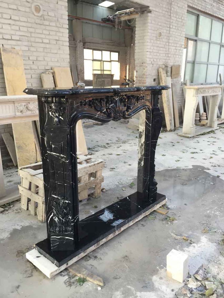 Natural black marble fireplace for home design