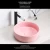 Import Pink round ceramic custom design wash basin WC bathroom counter top basin from China