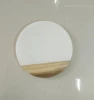 round marble-wood board with copper strip