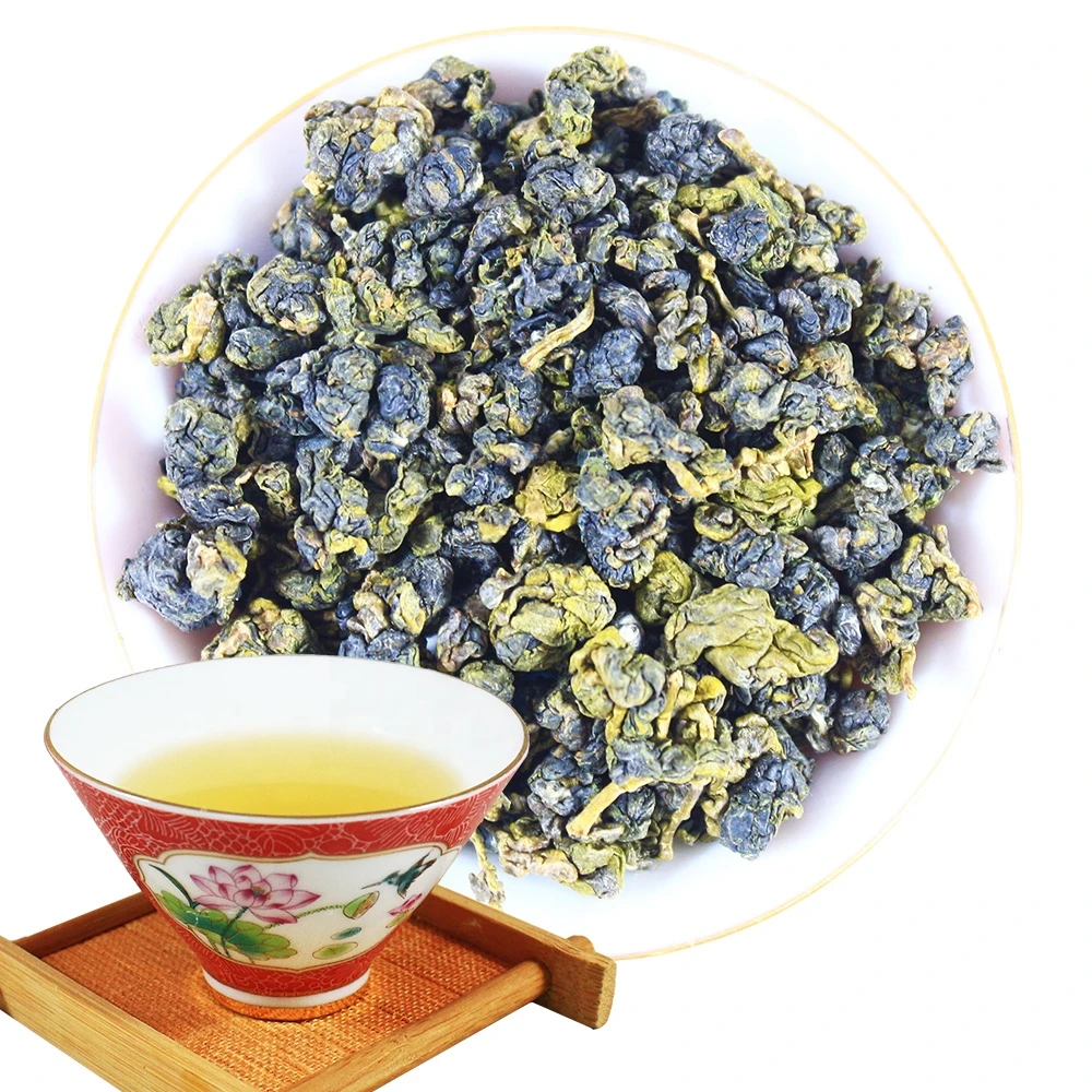 Taiwan Organic Oolong Green Tea Leaves with The floral scent spreading and spiraling in the air