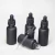 Import wholesale low price Matte Frosted Black Beard Oil Glass Dropper perfume Bottle 50ml 30ml from China