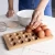 Import Wooden Egg Tray Wood Egg Crate Rack Tabletop Wooden Egg Holder from China