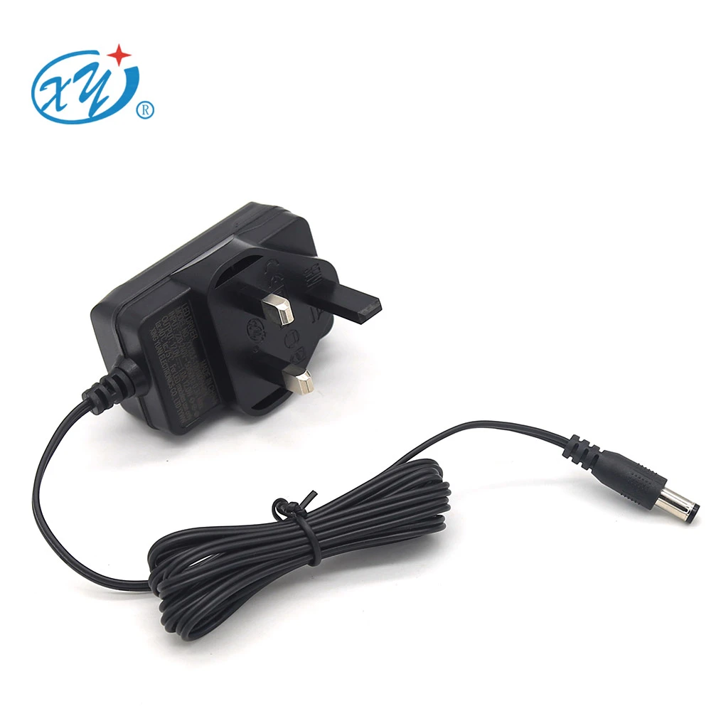 Xingyuan UKCA 12v 1a power adapter 24v 0.5a for uk market