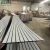 Import High Quality PVC Fluted Ceiling Wall Panel Modern Artistic Ceilings Living Room from China