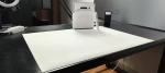 Portable table mat for eye-friendly touch projector setup