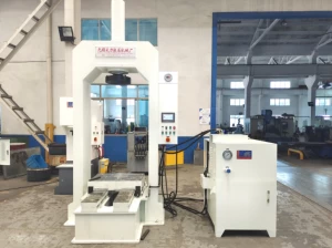 Gantry hydraulic press with front and rear moving worktable
