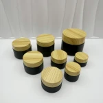 Empty container fine mist spray black fronted glass bottle with white plastic pump black fronted glass jar from China