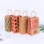 Import Folded Eco-friendly Carrier Business Portable Paper Bag from China