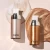 Import Glitter Gold Shimmer Spray Liquid Highlighter Make Up Spray Body Shimmer Spray For daily makeup from China