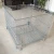 Import heavy duty large rolling metal steel wire mesh lockable storage container cage with wheels from China