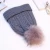 Import Hot Sale Custom 100% Acrylic Knitted Beanie Hat Fur Raccoon Pom Pom Thick Plush Warm Winter Hats for women from China