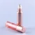 Import Luxury 5 6 8 10 15 ml empty essential oil round pink packaging cosmetic lip oil perfume bottles roller ball from China