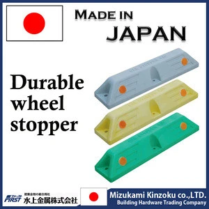 Tire stopper made in Japan with excellent withstand load used at the parking lot to stop car wheels