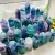 Import Wholesale Natural Quartz Crystal Point Rainbow Fluorite Tower Energy Wand from China