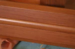 Wood grain powder coating