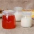 Import 100ml barattolo di miele 120ml pot de miel 150ml tea storage jar honey glass jar jam jar glassware bottles with lid from China