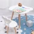 Import 2020 Hot sale Ins Nordic style Wooden Kids Table  and Chair Cartoon bear Shape Kindergarten Children Study Desk Set from China