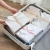 Import Amazon Best selling Plastic Dressbook Board Closet Organizer and Shirt Folder from China