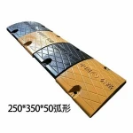 Curved stainless steel speed bump
