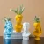 Import resin human face vase artificial human face planter sculpture for garden home decor Resin vase from China
