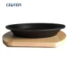 Round non stick cast iron restaurant sizzler serving dish plate with wood base