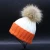 Import UK famous lady rib knit two tone beanie hat with detachable genuine fur pom from China