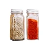 Wholesale kitchen glass spice jar and salt bottle pepper chili shaker garlic grinder bottle with shaker lid