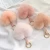 Import Wholesale raccoon dog fur ball pom pom keychain fluffy pom poms for bag pink faux fur heart ball key chains bulk from China