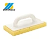 yellow sponge plaster trowel with plastic handle
