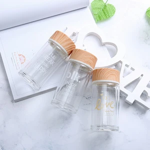 220ml custom logo mini glass water bottle with bamboo lid Wholesale