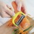 Import 3 in 1 multifunctional kitchen silicone non slip pp handle handheld apple potato onion stainless steel fruit vegetable peeler from China