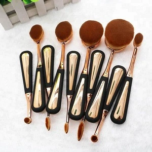 DW New Arrival Custom Logo Rose Gold/ Gold color Oval Cosmetics Brush Imported Wholesale Makeup