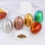 Import Lovely Kitchen Gadgets Egg Shaped Metal shaker Seasoning Jar Spice Jar from China