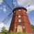 Import metal farm windmill house decor wooden garden windmill from China