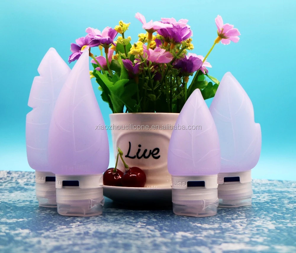 New arrive refillable silicone leaf shape soap dispenser travel set  bottle from china supplier