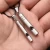 Import Titanium Emergency Whistle Loud Portable Keychain Necklace Whistle EDC Keyring for Emergency Survival Outdoor Hiking Camping from China