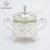 Import Tulip Design Metal Gold Plated Iron Round Shape Sugar Pot With Cover And Spoon from China