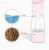 Import Wholesale plastic pet water bottle cat dog drinking food water bottle with rope from China