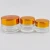Import 5g 10g 15g 20g 30g 50g 100g clear frosted amber clear cosmetic packaging empty cream glass jar with metal lid from China