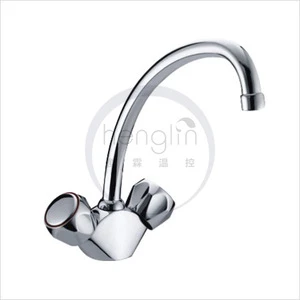 brass dual lever kitchen faucet