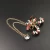 Import Christmas Crutches Chain Brooch Pin Collar Double Chain Xmas Candy Cane Shirt Brooch from China