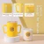 Import Colorful Double Handle Silicone High Borosilicate Milk Tea Glass Cup with Scale with Straw from China