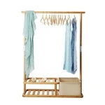 Creative indoor multi-functional bamboo floor coat rack with hamper