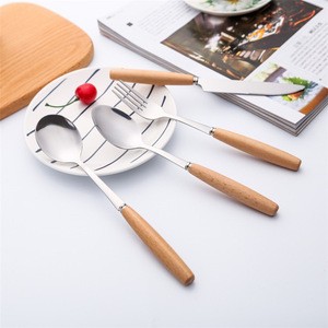 Eco-friendly wholesale hot sale wooden handle stainless steel tableware dinnerware set