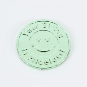 Embossed gold plated plastic token accepted custom design
