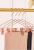 Import Heavy duty rose gold wire metal cloth trouser pant coat clothes hangers with 2 smooth clips for wardrobe closet boutique display from China