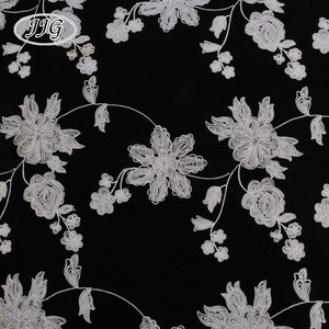 Hot sale romantic black comfortable linen rayon chain embroidery fabric for garment