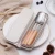 Import luxury wooden wood handle bamboo japan stainless steel restaurant flatware set from China
