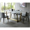 Rose gold stainless steel base dining table with marble design