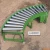 Import small size gravity unloading industrial roller conveyor from China